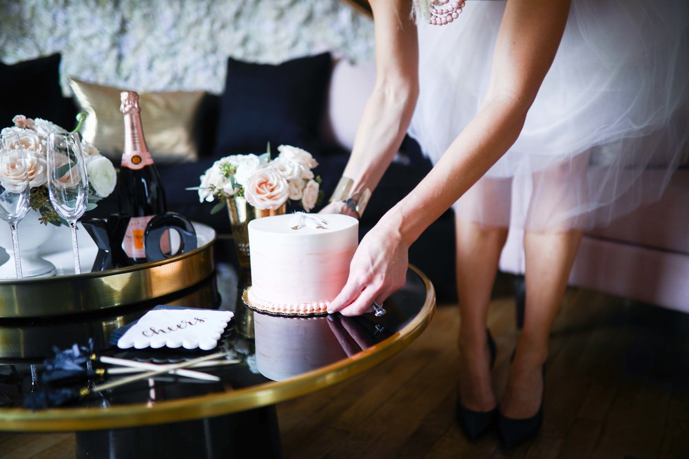  cake | flowers | skirt | heels | cuff |  tray | napkins | furniture 
