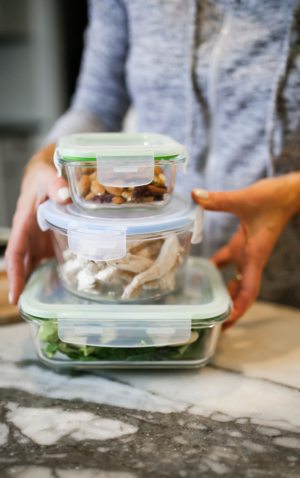  healthy food stacked in glass storage containers 